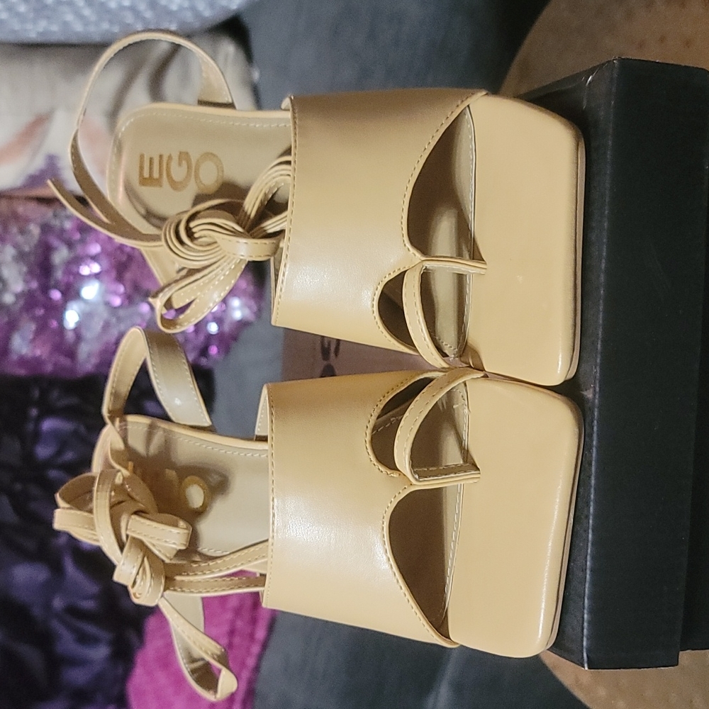 Tan string up heel